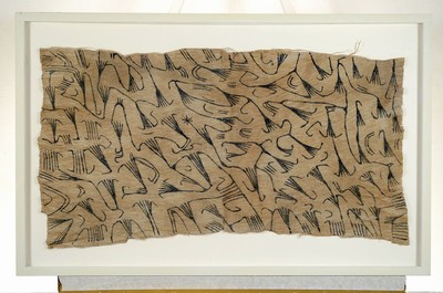 Image Felt cloth, probably loincloth of the Pygmies,Central Africa, 20th century, felt, painted black with stylized floral motifs, 82x40 cm, framed under glass 93x60 cm