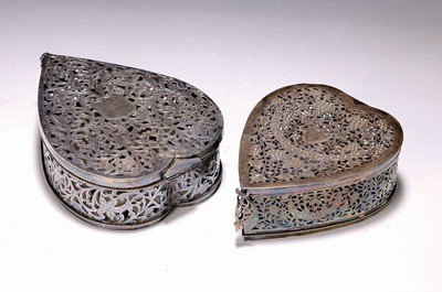 Image 2 heart-shaped lidded boxes, Middle East, 20thcentury, rim and lid in breakthrough work withtendrils, leaves and flowers, approx. 5.5x18x14 cm, or 5.5x6x12cm