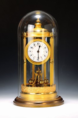 Image Annual clock with rotating pendulum, model Louvre, watch manufacturer treasure, around 1950-60, brass casing in pavilion shape with mineral glass dome, enamel dial with floral arcades, Graham gear with pallets, with pendulum spring protective sleeve, tested in ashort-term test, starts running, height with glass dome approx. 44cm, condition of movement2- 3, housing 2
