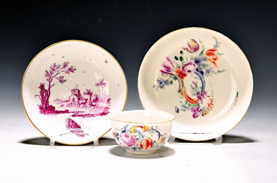 Image Cup with saucer and single saucer, Höchst, 18th century, polychrome painting of flowers and rocailles, gold rims, saucer with purple camaieu painting, landscape with cows and large butterfly, gold rim; slight traces of age
