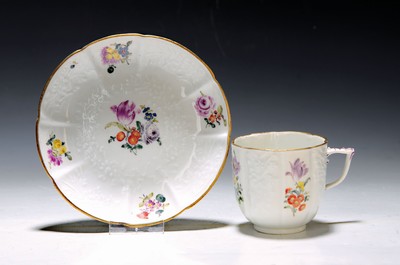 Image Cup with saucer, Meissen, from the Johann Ernst Gotzkowsky service, around 1742, model by Johann Friedrich Eberlein, painting with bouquets of flowers, rich floral relief decoration, cup restored, plate D. 15 cm, cup H. 7 cm