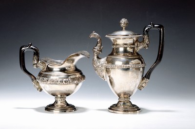 Image Coffee pot and large milk jug, Austria, around1855, Vienna, silver, partly chased, wooden handles, surrounding fruit shelves, coffee potl. compressed, approx. 1050 g, slight traces of age