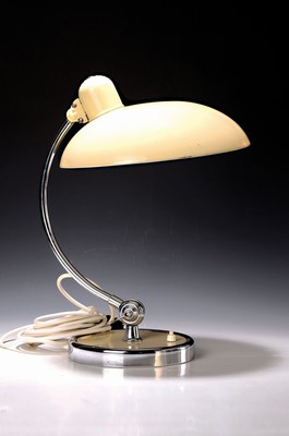Image Desk lamp, Kaiser Idell model 6631, 1930s, painted cream white, round base with chrome ring, curved and chrome-plated candlestick armadjustable, dome-shaped shade, electrical not tested, height approx. 42cm