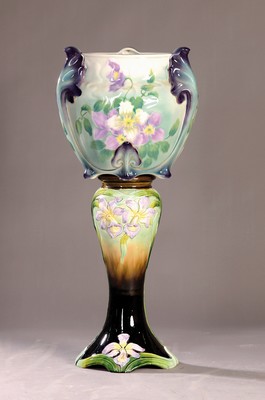 Image flowers planter with column, France, around 1900, Art Nouveau, fine stoneware floral embossment (iris) and colorful painted, pot cracked, total h. approx. 77cm, traces of usage